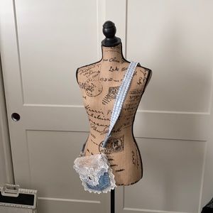 Jean 👛 purse that can be worn on one shoulder.